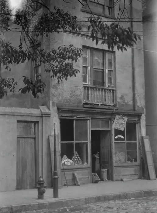 Framed Print : Facade of a grocery store, New Orleans or Charleston, South Carolina, between 1920 and 1926. Creator: Arnold Genthe Framed Print : Facade of a grocery store, New Orleans or Charleston, South Carolina, between 1920 and 1926. Creator: Arnold Genthe