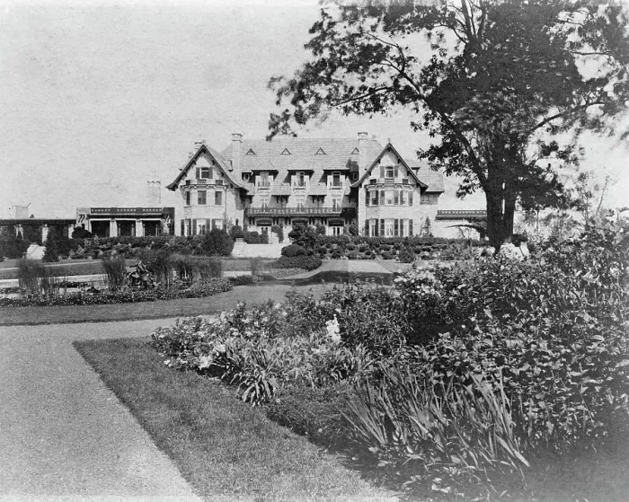 Framed Print : Facade of home of Edmund Cogswell Converse, with flowers in foreground, Greenwich, Connecticut, 1908 Creator: Frances Benjamin Johnston Framed Print : Facade of home of Edmund Cogswell Converse, with flowers in foreground, Greenwich, Connecticut, 1908 Creator: Frances Benjamin Johnston