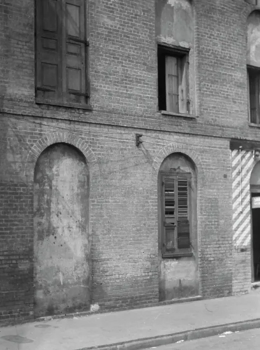 Framed Print : Facade of a multi-story building, New Orleans or Charleston, South Carolina, between 1920 and 1926. Creator: Arnold Genthe Framed Print : Facade of a multi-story building, New Orleans or Charleston, South Carolina, between 1920 and 1926. Creator: Arnold Genthe