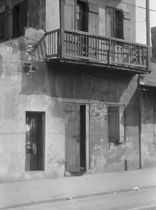 Framed Print : Facade of a multi-story house in the French Quarter, New Orleans, between 1920 and 1926. Creator: Arnold Genthe Framed Print : Facade of a multi-story house in the French Quarter, New Orleans, between 1920 and 1926. Creator: Arnold Genthe