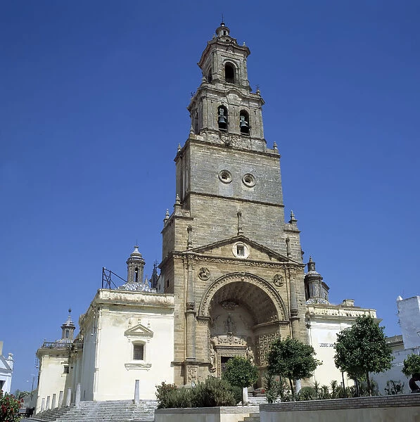 Facade and tower of the Church of Santa Maria de la Asuncion in Utrera (Sevilla)