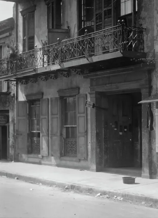 Framed Print : Facades of buildings along a street in the French Quarter, New Orleans, between 1920 and 1926. Creator: Arnold Genthe Framed Print : Facades of buildings along a street in the French Quarter, New Orleans, between 1920 and 1926. Creator: Arnold Genthe