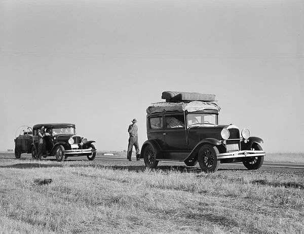 Two families originating from Independence, Kansas, US99, between Tulare and Fresno, 1939. Creator: Dorothea Lange