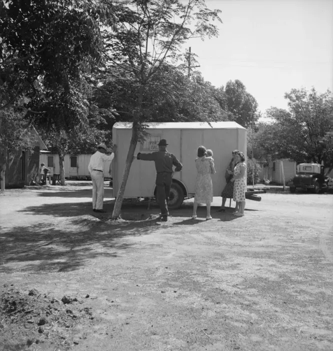 Framed Print : Family inspect a house trailer with idea of purchase, between Tulare and Fresno on U. S. 99, 1939. Creator: Dorothea Lange Framed Print : Family inspect a house trailer with idea of purchase, between Tulare and Fresno on U. S. 99, 1939. Creator: Dorothea Lange