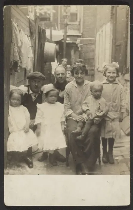 Framed Print : Family portrait in tenement alley, about 1913-1925. Creator: John Frank Keith Framed Print : Family portrait in tenement alley, about 1913-1925. Creator: John Frank Keith