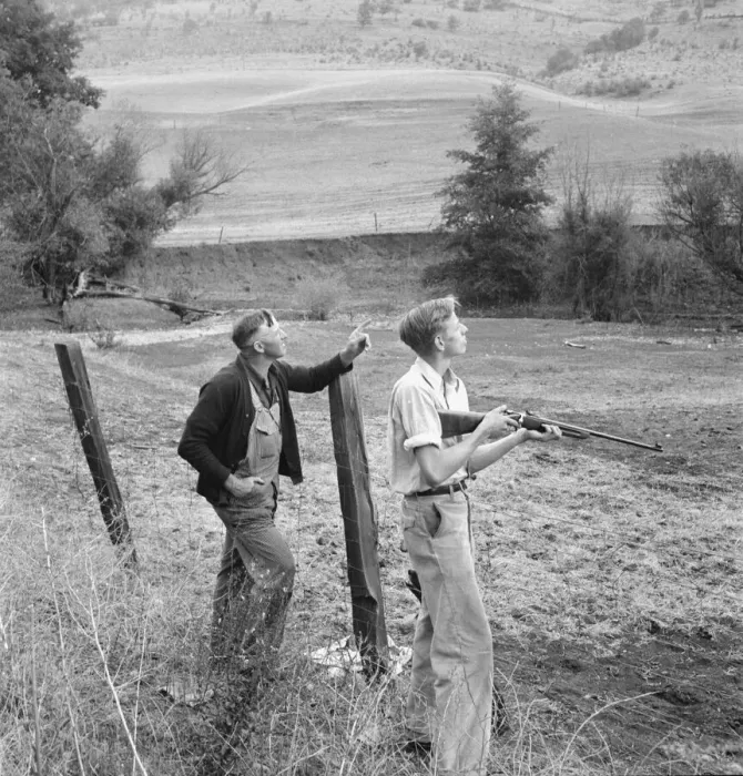 Framed Print : Farmer and boy in the fall of the year at the time the hunting... Jackson County, Oregon, 1939. Creator: Dorothea Lange Framed Print : Farmer and boy in the fall of the year at the time the hunting... Jackson County, Oregon, 1939. Creator: Dorothea Lange