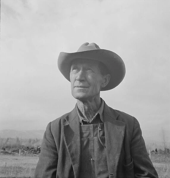 Farmer from Nebraska now developing eighty-acre stump farm, Bonner County, Idaho, 1939. Creator: Dorothea Lange