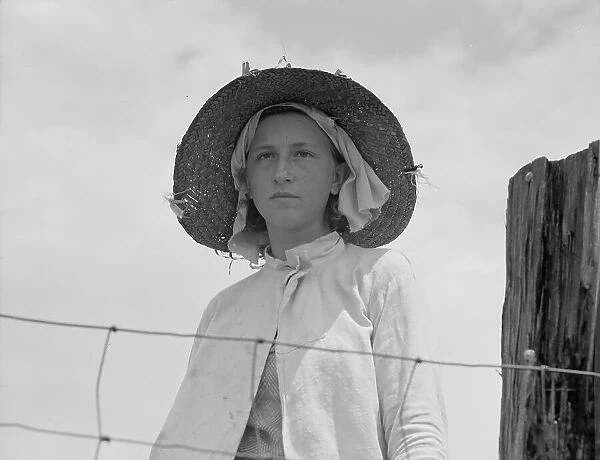 Farmer's daughter in the fields, farm in Georgia, 1937. Creator: Dorothea Lange