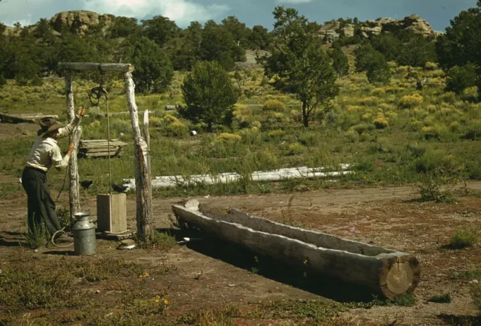 Framed Print : Faro Caudill drawing water from his well, Pie Town, New Mexico, 1940. Creator: Russell Lee Framed Print : Faro Caudill drawing water from his well, Pie Town, New Mexico, 1940. Creator: Russell Lee
