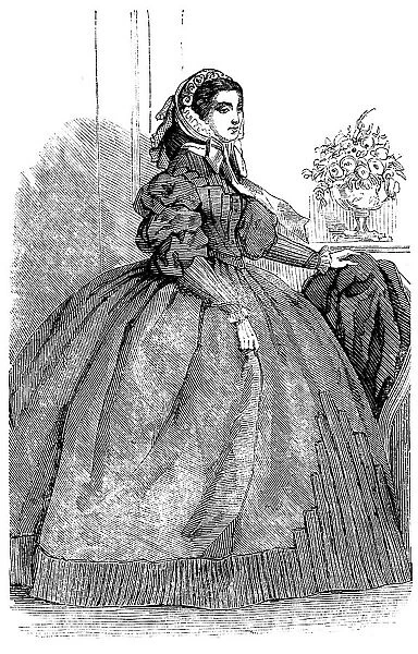 Fashions for November - Dress of Silver-Grey Silk, 1858. Creator: Unknown