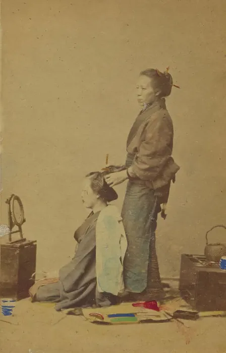 Framed Print : Female hair dresser, 1870-1880. Creator: Unknown Framed Print : Female hair dresser, 1870-1880. Creator: Unknown