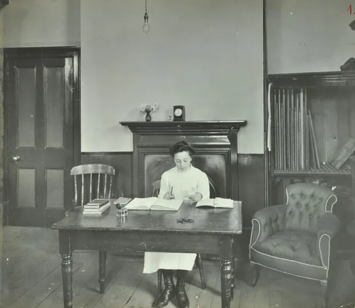 Framed Print : Female student sitting at desk, Shoreditch Technical Institute, London, 1907 Framed Print : Female student sitting at desk, Shoreditch Technical Institute, London, 1907