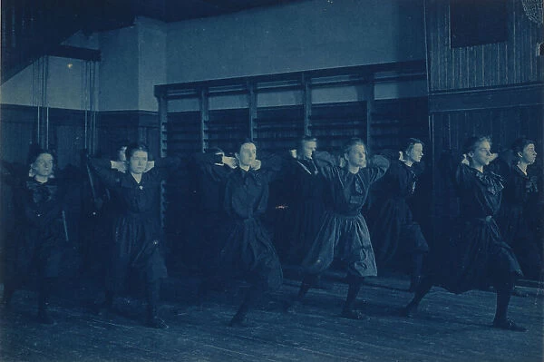 Female students exercising in a gymnasium, Western High School, Washington, D.C. (1899?). Creator: Frances Benjamin Johnston