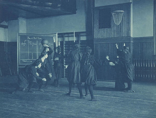 Female students playing basketball, Western High School, Washington, D.C. (1899?). Creator: Frances Benjamin Johnston