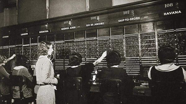 Female workers in the telephone room, New York Stock Exchange, USA, early 1930s. Artist