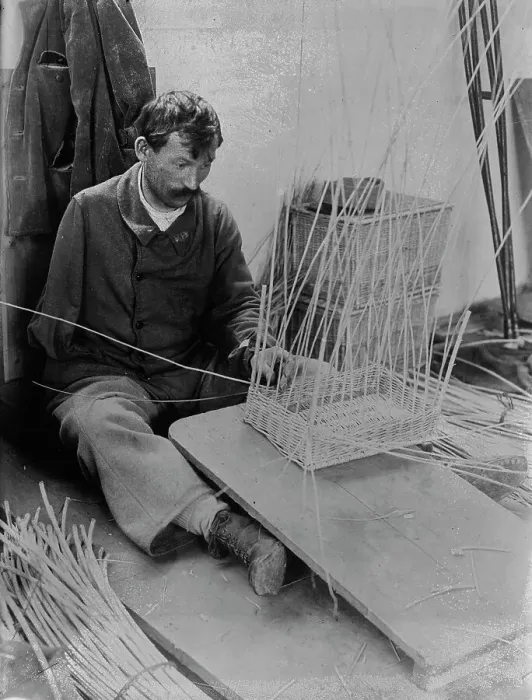 Framed Print : Fernand Bihery [making baskets, French School for crippled soldiers], 1918. Creator: Bain News Service