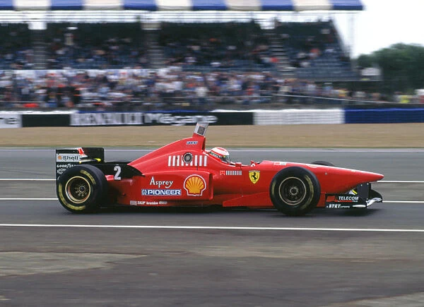 Ferrari F310, Eddie Irvine, 1996 British Grand Prix, Silverstone. Creator: Unknown