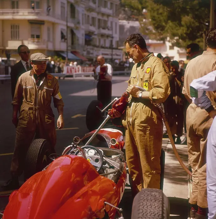 Framed Print : A Ferrari team member filling a car with fuel, Monaco Grand Prix, Monte Carlo, 1963
