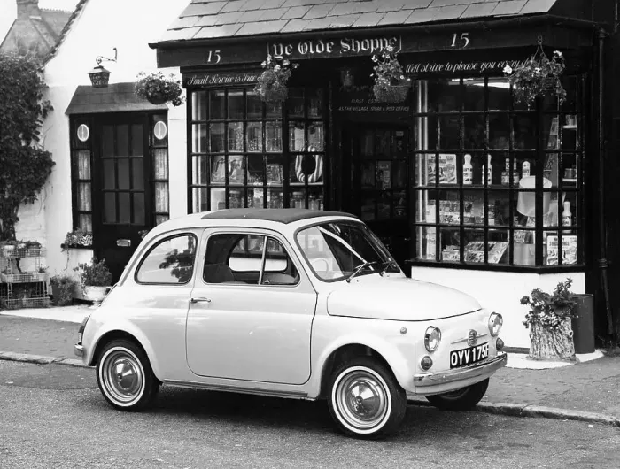 Framed Print : Fiat 500 parked outside a quaint shop, 1969 Framed Print : Fiat 500 parked outside a quaint shop, 1969