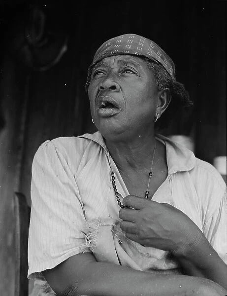 Fifty-seven year old sharecropper woman, Hinds County, Mississippi, 1937. Creator: Dorothea Lange