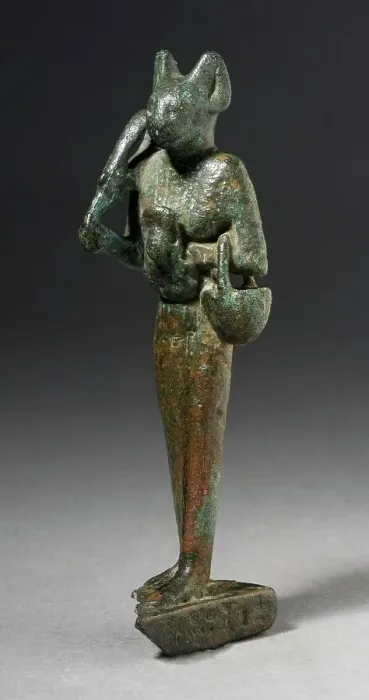 Framed Print : Figurine of Standing Cat Headed Goddess with Sistrum, Probably Ptolemaic Period (332-30 BCE). Creator: Unknown Framed Print : Figurine of Standing Cat Headed Goddess with Sistrum, Probably Ptolemaic Period (332-30 BCE). Creator: Unknown