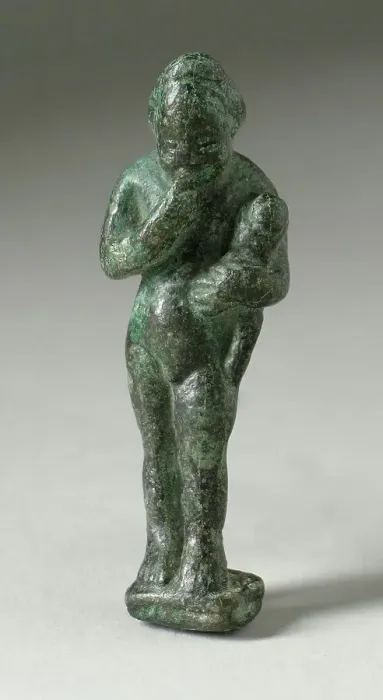Framed Print : Figurine of a Standing Naked Man Holding a Baby, Ptolemaic Period-early Roman Period 200 BCE-100 CE. Creator: Unknown Framed Print : Figurine of a Standing Naked Man Holding a Baby, Ptolemaic Period-early Roman Period 200 BCE-100 CE. Creator: Unknown