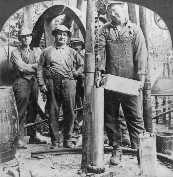 Framed Print : Filling a shell with nitro-glycerine, oil field in Pennsylvania, USA, early 20th century(?). Artist: Keystone View Company Framed Print : Filling a shell with nitro-glycerine, oil field in Pennsylvania, USA, early 20th century(?). Artist: Keystone View Company
