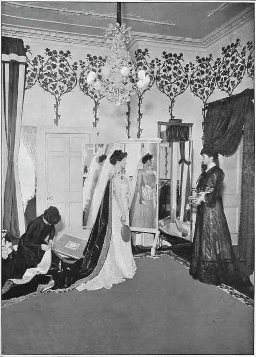 Framed Print : The finishing touches of a dressmaker, London, c1901 (1901) Framed Print : The finishing touches of a dressmaker, London, c1901 (1901)