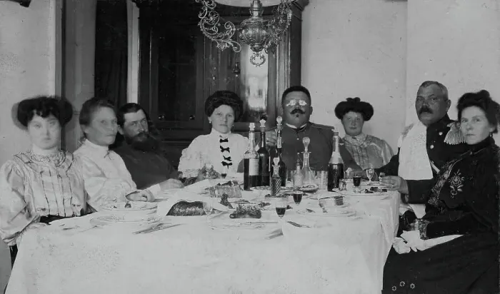 Framed Print : Fire Chief A. F. Domishkevich Sitting at a Table Set for a Holiday Together with... early 20th cent Creator: Unknown Framed Print : Fire Chief A. F. Domishkevich Sitting at a Table Set for a Holiday Together with... early 20th cent Creator: Unknown