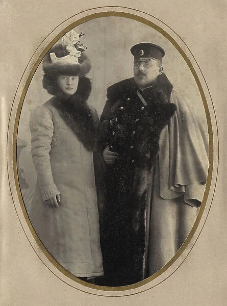 Fire Chief A. F. Domishkevich in the Winter Uniform of a Firefighter (With His Wife), 1901. Creator: N. A. Lavrov