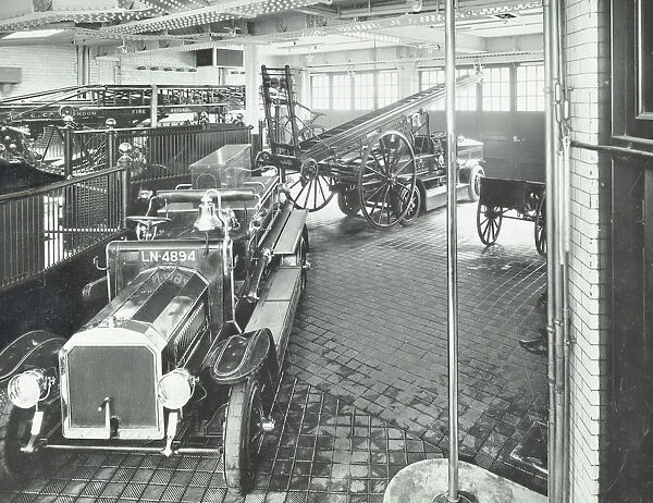 Fire engines and equipment at Cannon Street Fire Station, City of London, 1913
