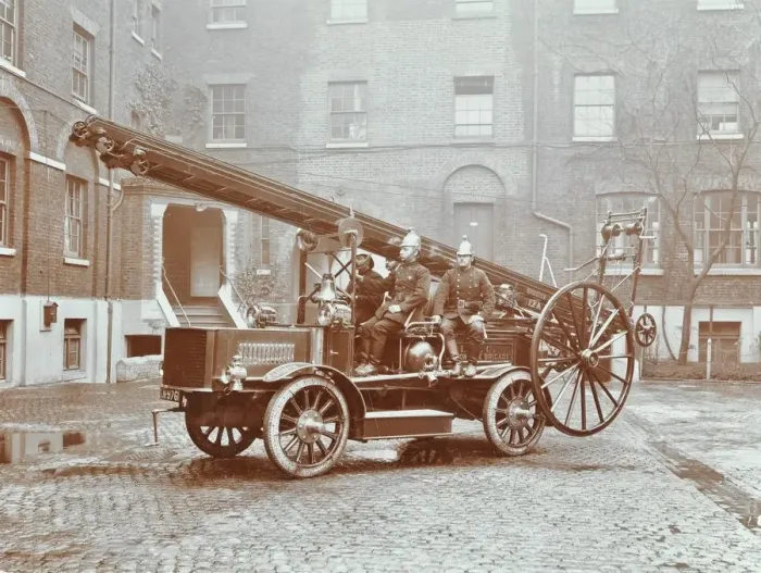 Framed Print : Firemen aboard a motor fire escape vehicle, London Fire Brigade Headquarters, London, 1909 Framed Print : Firemen aboard a motor fire escape vehicle, London Fire Brigade Headquarters, London, 1909