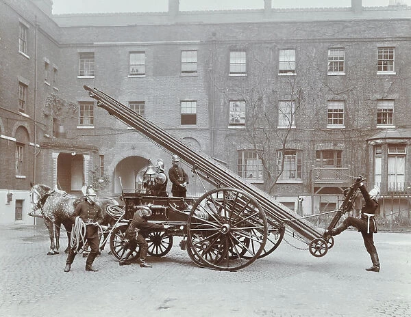 Firemen demonstrating a horse-drawm escape vehicle, London Fire Brigade Headquarters, London, 1910