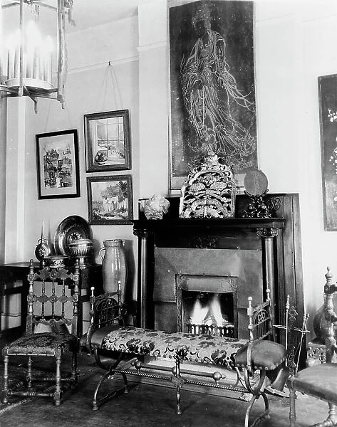 Fireplace, furniture, and works of art in Frances Benjamin Johnston's... New Orleans, c1920 - 1950. Creator: Frances Benjamin Johnston