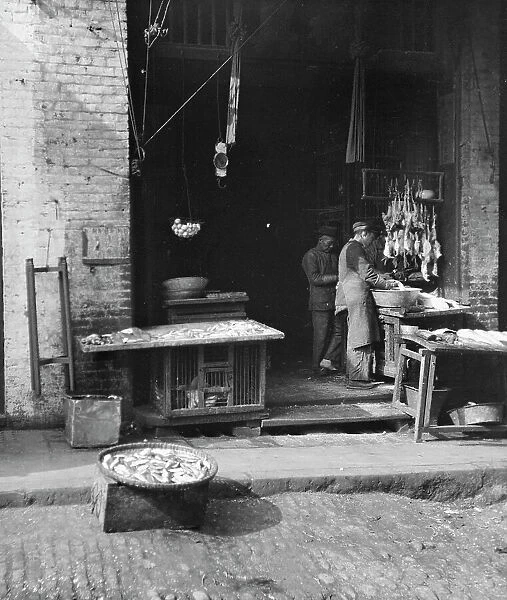 Fish Alley, Chinatown, San Francisco, between 1896 and 1906. Creator: Arnold Genthe