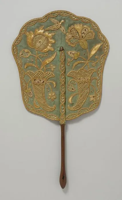 Framed Print : Fixed fan of green silk with straw embroidery and wooden handle, England, c.1740. Creator: Unknown