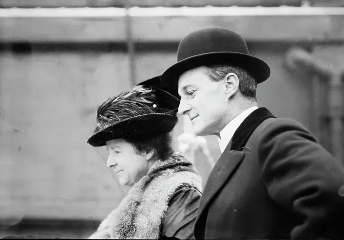 Framed Print : F.J. Shepard and wife departing, 1913. Creator: Bain News Service Framed Print : F.J. Shepard and wife departing, 1913. Creator: Bain News Service