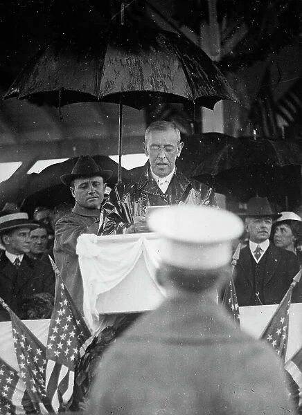 Flag Day - Wilson Making Address in Rain. Lansing 2nd from Right, 1917. Creator: Harris & Ewing. Flag Day - Wilson Making Address in Rain. Lansing 2nd from Right, 1917. Creator: Harris & Ewing