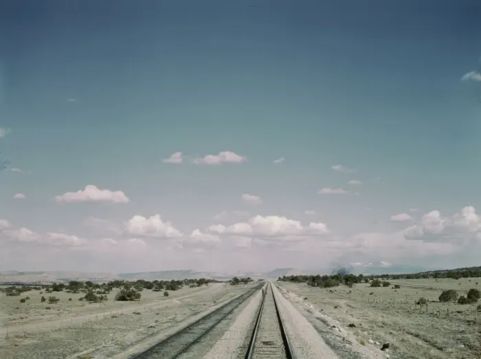 Framed Print : Flagman standing behind his train to flag oncoming trains at a small siding... New Mexico, 1943. Creator: Jack Delano Framed Print : Flagman standing behind his train to flag oncoming trains at a small siding... New Mexico, 1943. Creator: Jack Delano