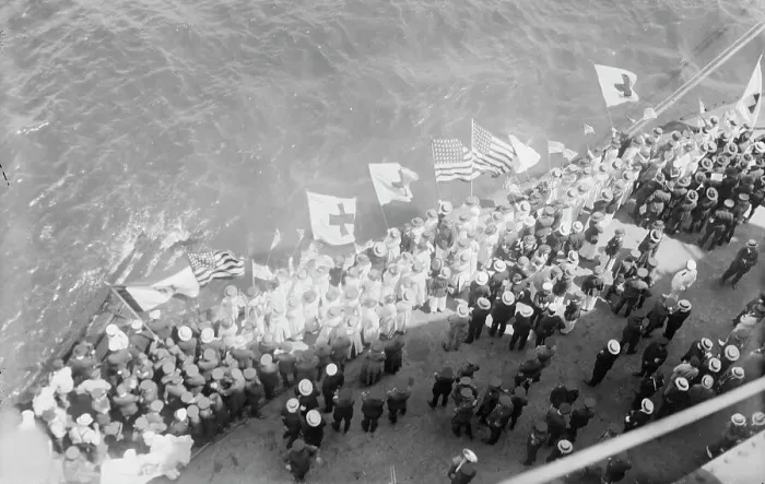 Framed Print : Flags greet Wilson, between c1915 and c1920. Creator: Bain News Service