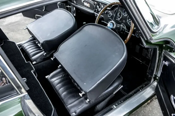 Framed Print : Folded down front seats of a 1961 Aston Martin DB4 GT previously owned by Donald Campbell Framed Print : Folded down front seats of a 1961 Aston Martin DB4 GT previously owned by Donald Campbell
