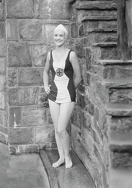 Ford, Elsie, Miss, standing outdoors in a bathing suit, 1932 July. Creator: Arnold Genthe