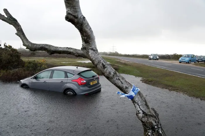 Framed Print : Ford Focus in flooded ditch after losing control on wet road 2012 Framed Print : Ford Focus in flooded ditch after losing control on wet road 2012