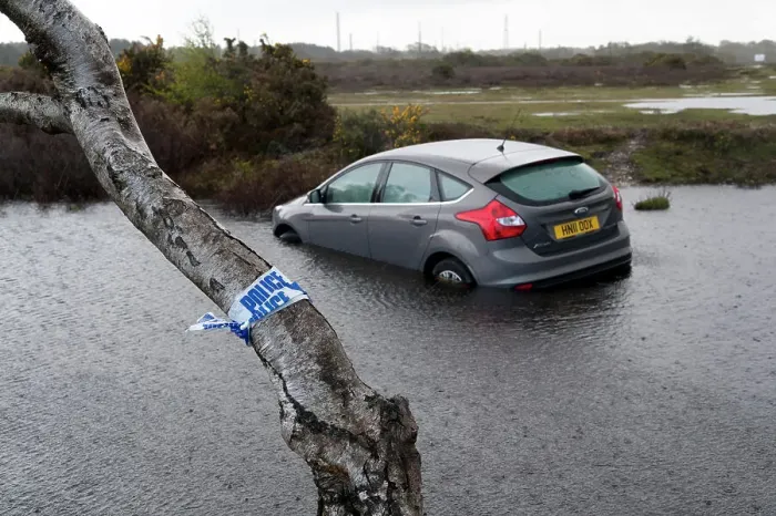 Framed Print : Ford Focus in flooded ditch after losing control on wet road 2012 Framed Print : Ford Focus in flooded ditch after losing control on wet road 2012