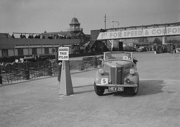 Ford Prefect tourer competing in the JCC Rally, Brooklands, Surrey, 1939. Artist: Bill Brunell