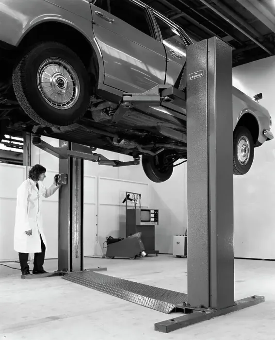 Framed Print : A Ford Zodiac on a Laycock asymmetric lift, 1972. Artist: Michael Walters Framed Print : A Ford Zodiac on a Laycock asymmetric lift, 1972. Artist: Michael Walters