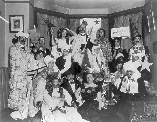 Frances Benjamin Johnston, with friends at costume party, bottom center, n.d.. Creator: Frances Benjamin Johnston