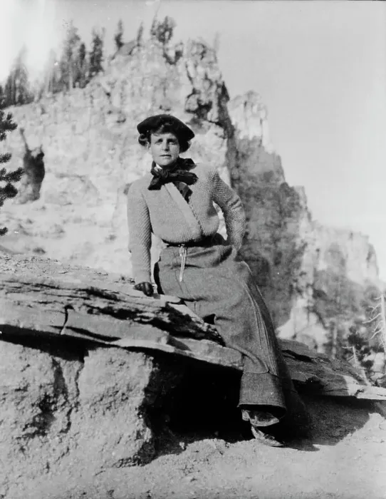 Framed Print : Frances Benjamin Johnston, full-length portrait, seated on rock in Yellowstone National Park, 1903. Creator: Frances Benjamin Johnston Framed Print : Frances Benjamin Johnston, full-length portrait, seated on rock in Yellowstone National Park, 1903. Creator: Frances Benjamin Johnston