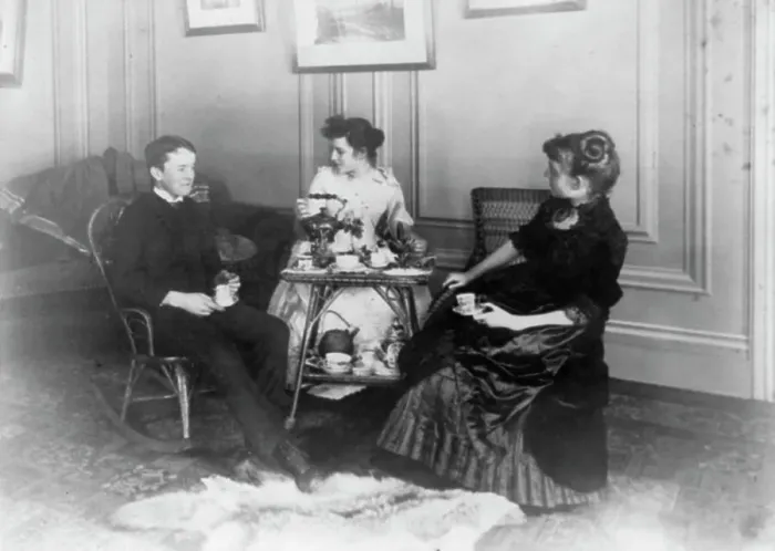 Framed Print : Frances Benjamin Johnston, full lgth. seated, having tea with 2 other people, n.d.. Creator: Frances Benjamin Johnston Framed Print : Frances Benjamin Johnston, full lgth. seated, having tea with 2 other people, n.d.. Creator: Frances Benjamin Johnston