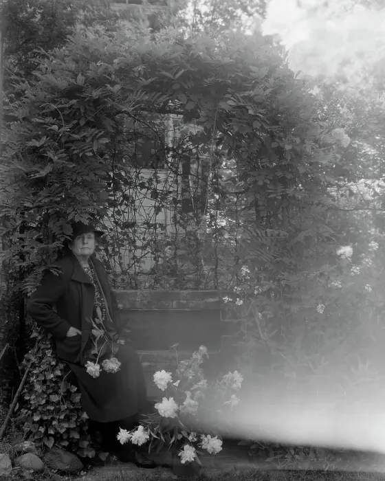 Framed Print : Frances Benjamin Johnston, photographer, posed sitting with peonies... Takoma Park, Maryland, 1938. Creator: Unknown Framed Print : Frances Benjamin Johnston, photographer, posed sitting with peonies... Takoma Park, Maryland, 1938. Creator: Unknown